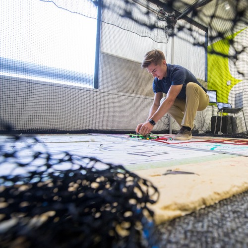 Student working on drone