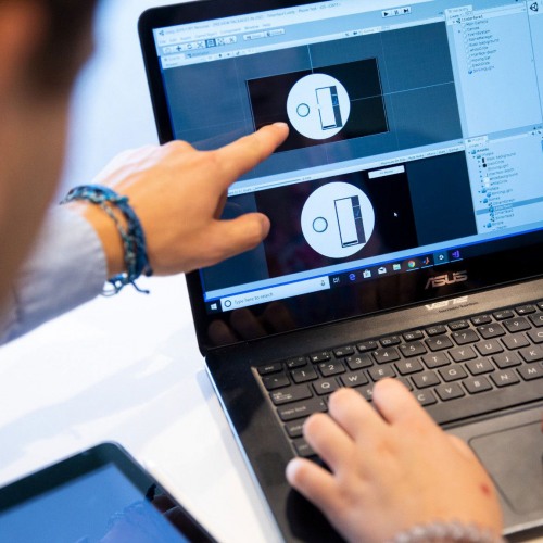 Man pointing at a computer screen