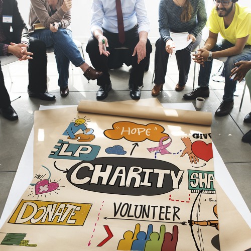 Sitting around poster with word cloud on it