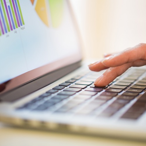 Charts and graphs on laptop screen